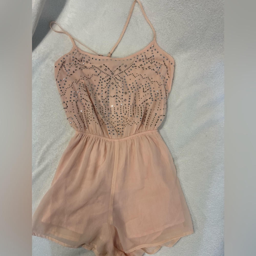 Light pink size medium Hollister romper